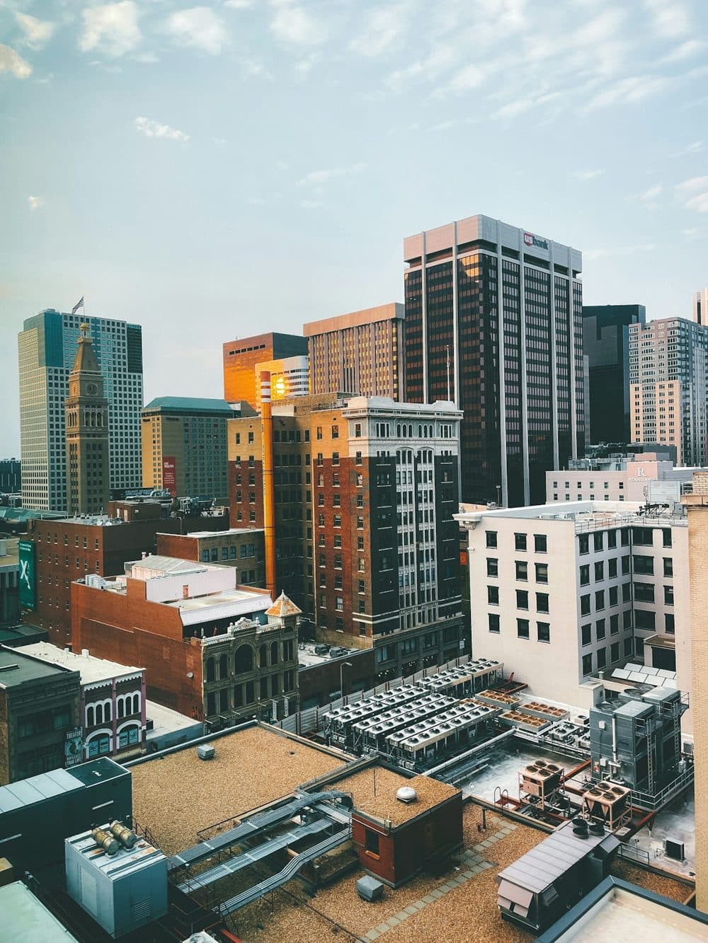 Downtown Denver skyline with historic brick buildings and towers