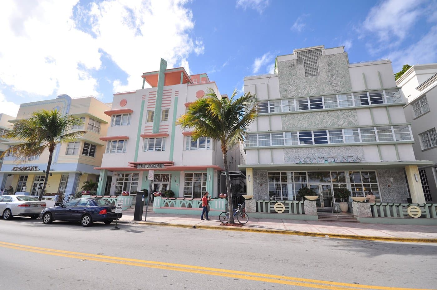Pastel Art Deco hotels with palm trees on Ocean Drive in Miami Beach