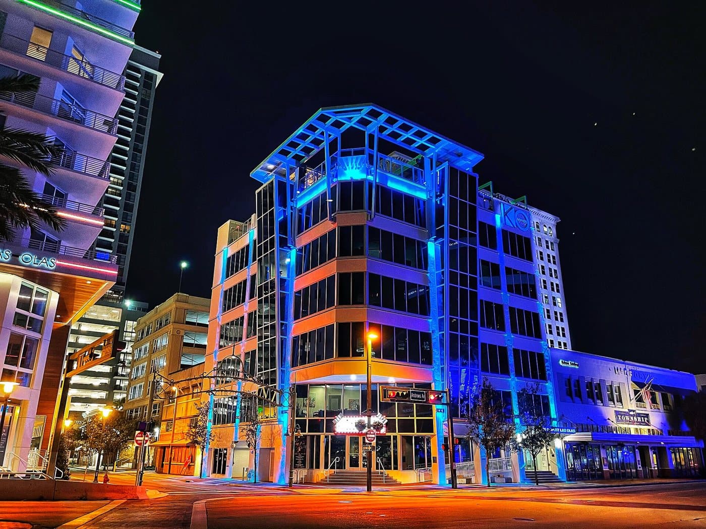 Downtown Fort Lauderdale buildings lit up at night near Las Olas